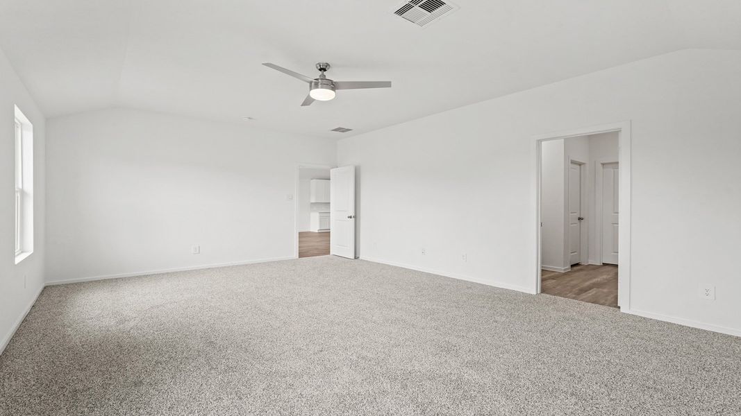Spacious, unfurnished interior of a new home in Sunterra, Katy (Image 21).