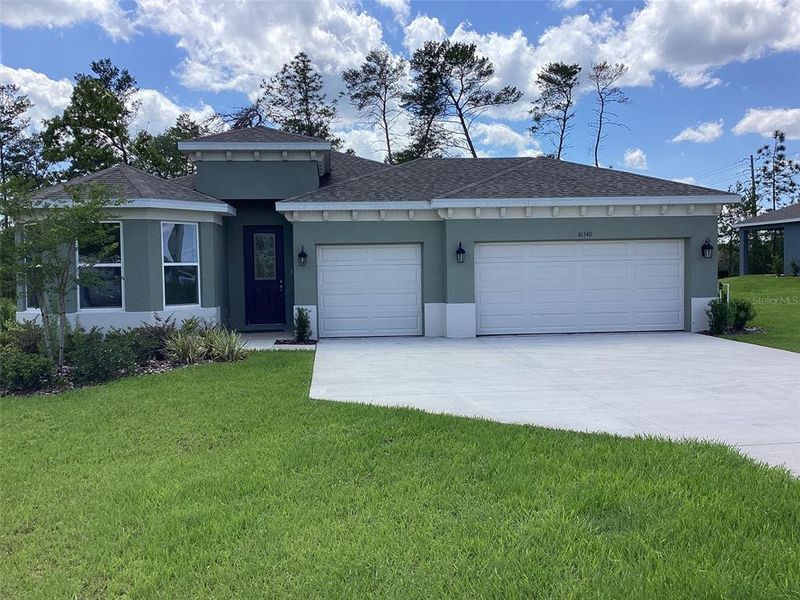 Front exterior of a new home in , Ocala, FL, highlighting curb appeal (Image 22).
