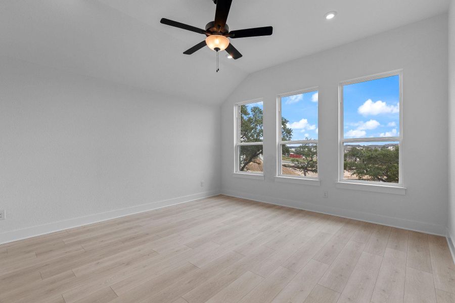 Primary Bedroom with elevated ceiling