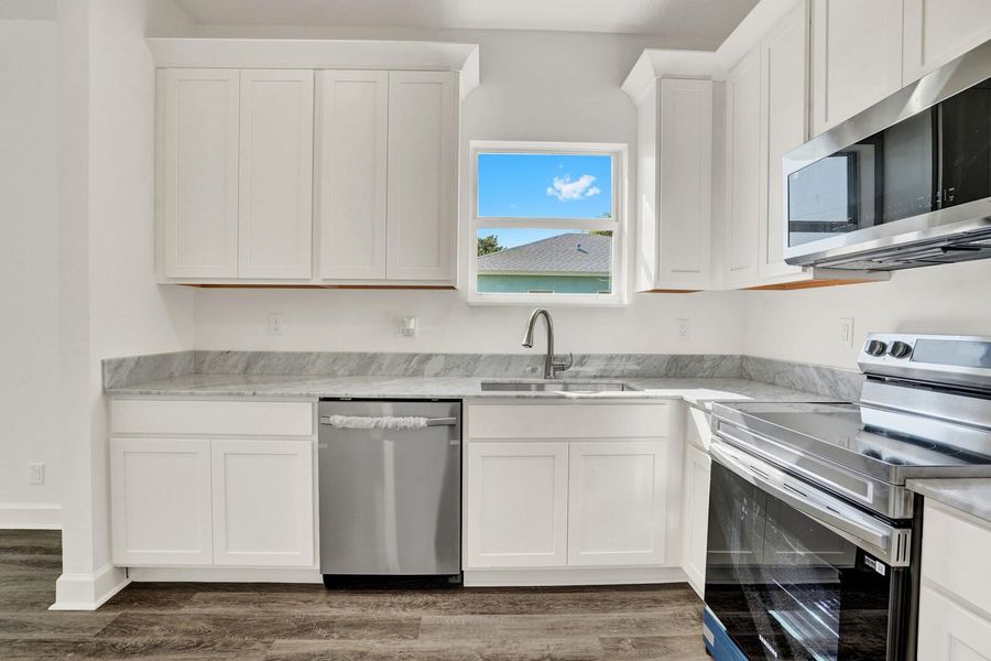 Furnished interior view inside a new home in , Lantana (Image 5).