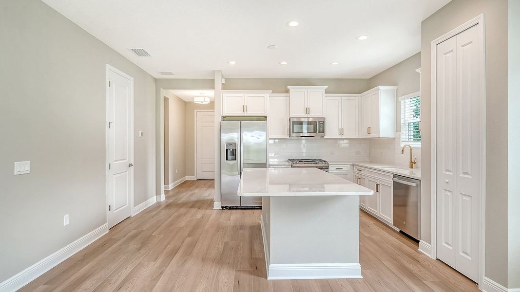 Furnished interior view inside a new home in Wildleaf Real Estate and Homes for Sale in Parrish, FL - Neal Communities, Parrish (Image 9).