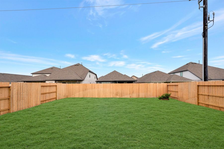 Exterior details and patio area of a home in Mason Woods, Cypress (Image 22). Exterior details and patio area of a home in Mason Woods, Cypress (Image 22).
