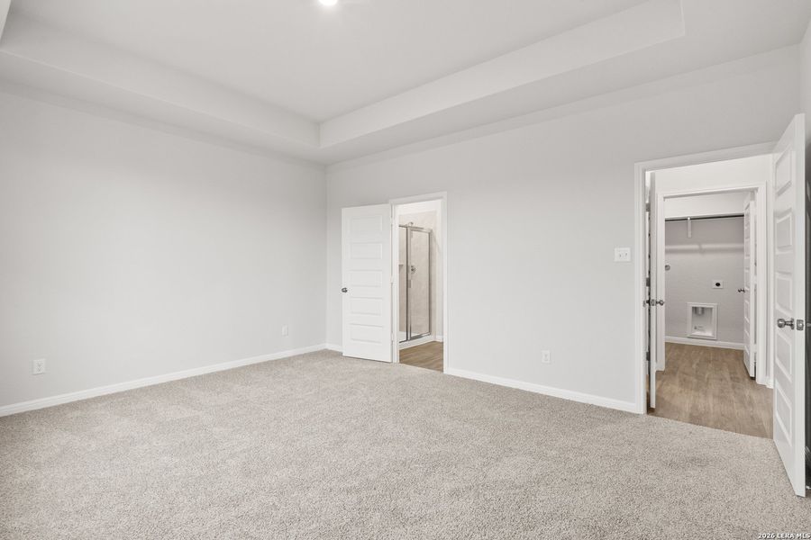 Spacious, unfurnished interior of a new home in Hunters Ranch, San Antonio (Image 26).