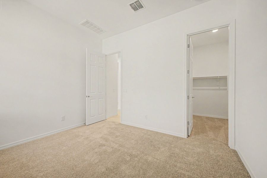 Spacious, unfurnished interior of a new home in Empire Pointe, Queen Creek (Image 11).