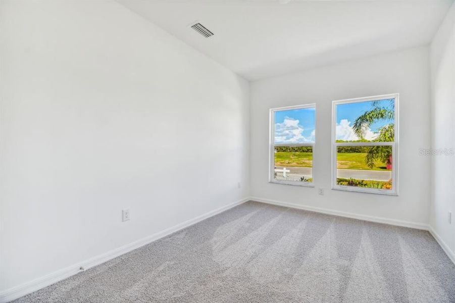 Spacious, unfurnished interior of a new home in The Hammocks at West Port, Port Charlotte (Image 8).