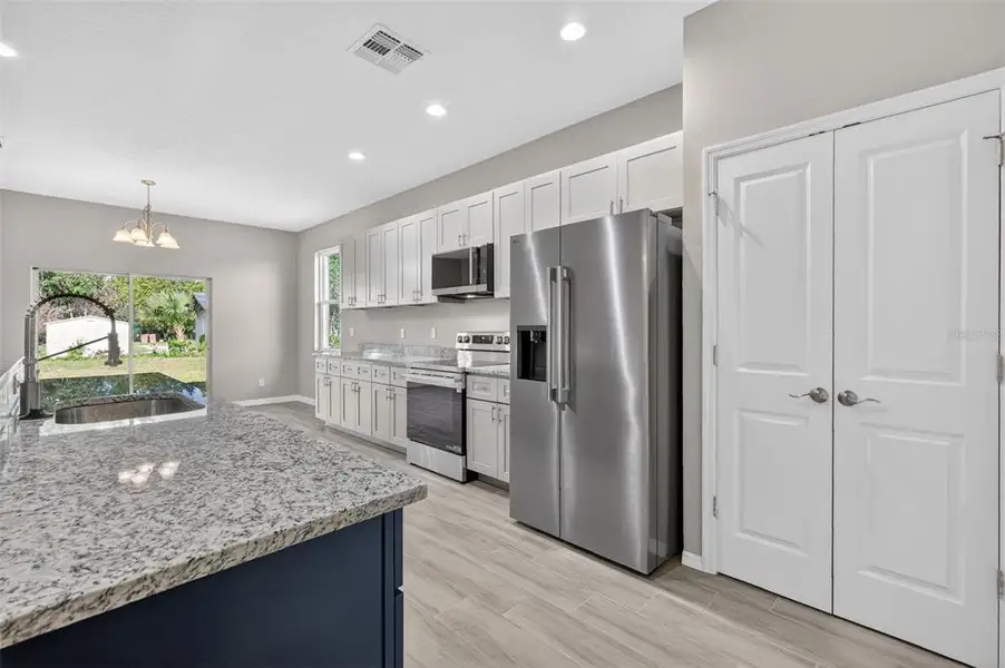 Furnished interior view inside a new home in , Umatilla (Image 6).