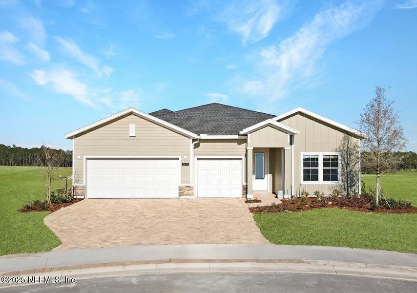 Front exterior of a new home in Edenbrooke at Hyland Trail | 55+: Edenbrooke at Hyland Trail 60s, Green Cove Springs, FL, highlighting curb appeal (Image 15).