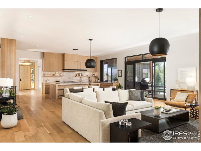 At the heart of the home, the open-concept kitchen, dining, and great room create a dramatic yet inviting gathering space. At the heart of the home, the open-concept kitchen, dining, and great room create a dramatic yet inviting gathering space.