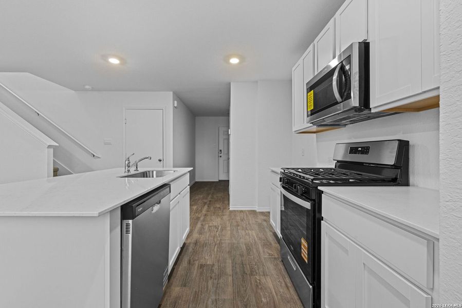 Furnished interior view inside a new home in Avenida, Converse (Image 6).