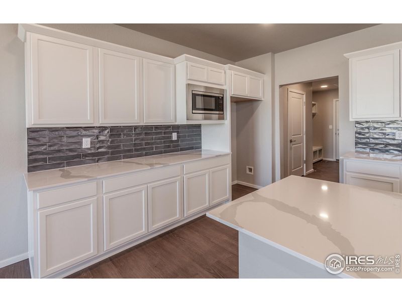 Furnished interior view inside a new home in Trailside Alley Load - Single Family Homes, Timnath (Image 9).