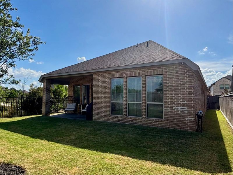 Exterior details and patio area of a home in Bridgeland 45', Cypress (Image 15).