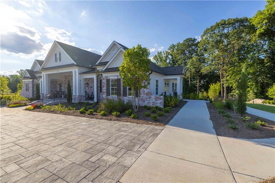 Front exterior of a new home in , Peachtree Corners, GA, highlighting curb appeal (Image 19).