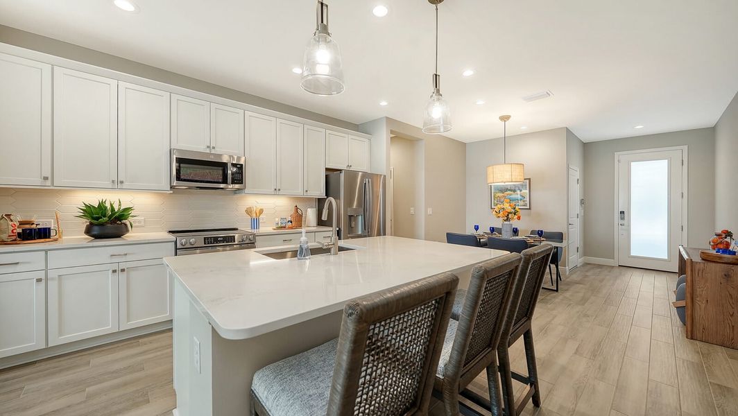 Representative furnished interior of a home built from the Avery by Neal Communities in SkySail, Naples (Image 10).