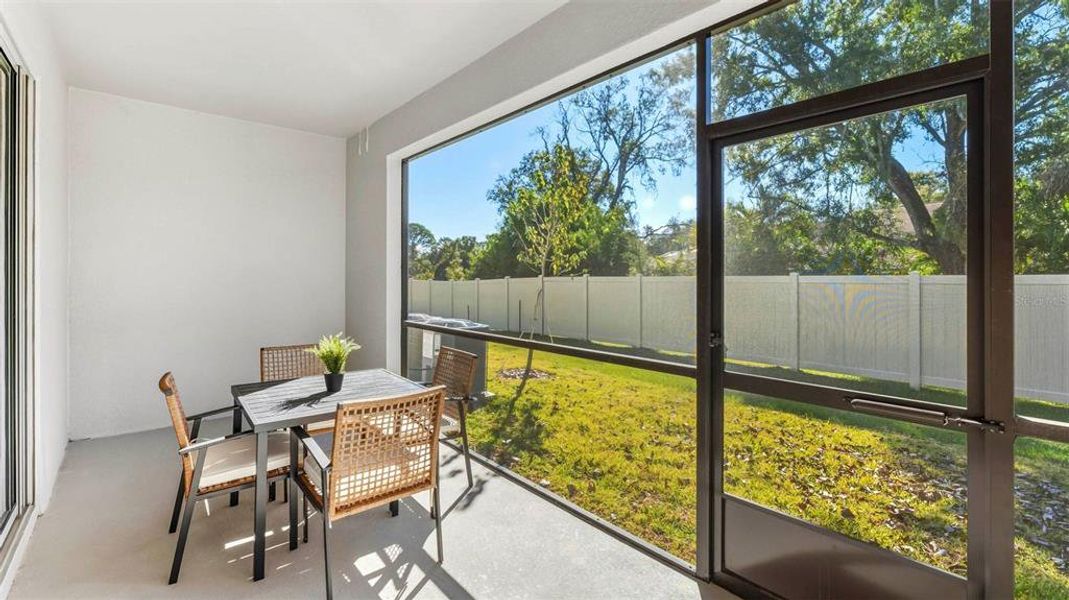 Exterior details and patio area of a home in The Gardens at Bay Street, Sarasota (Image 3). Exterior details and patio area of a home in The Gardens at Bay Street, Sarasota (Image 3).