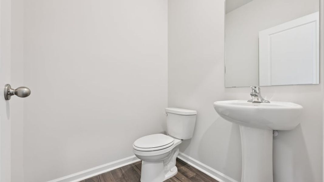 Furnished interior view inside a new home in Gretchen Pines, West End (Image 10).