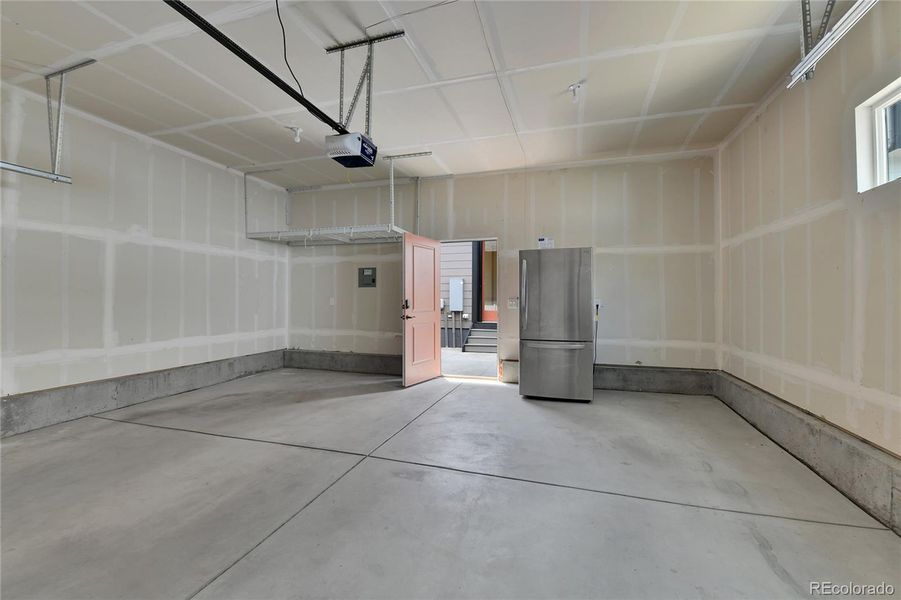 2 Car Garage - Overhead Storage and Refrigerator Included