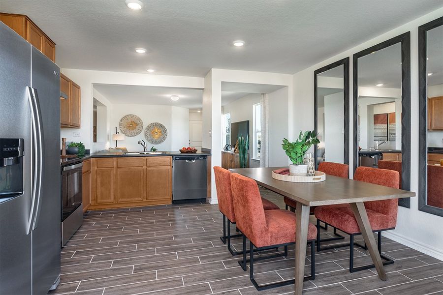 Representative furnished interior of a home built from the Plan 1243 Modeled by KB Home in The Granary - Heritage Collection, San Antonio (Image 5). Representative furnished interior of a home built from the Plan 1243 Modeled by KB Home in The Granary - Heritage Collection, San Antonio (Image 5).