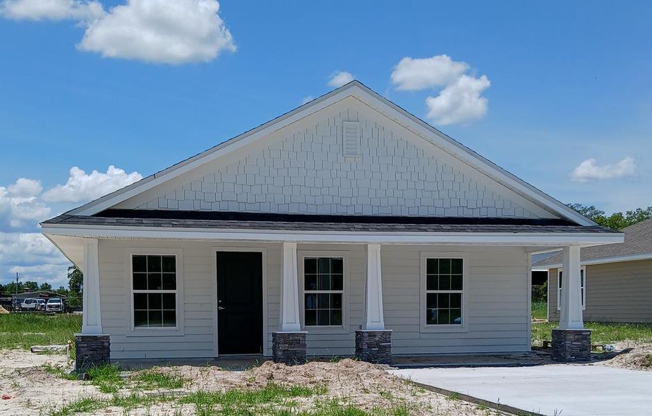 Front exterior of a home in the Rolling Hills community, located in Bell, FL (Image 8).