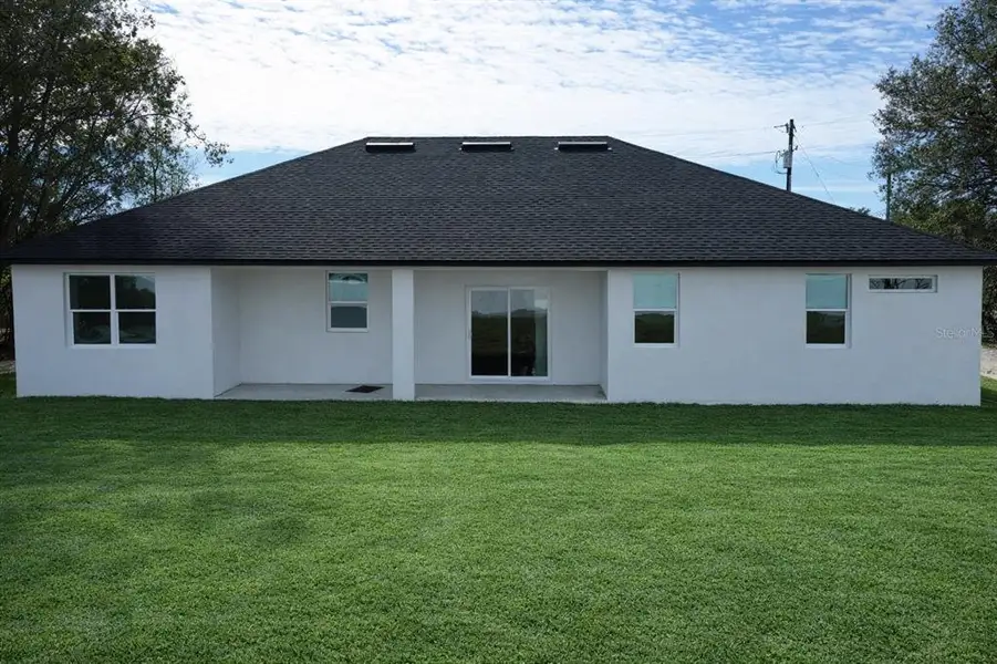 Exterior details and patio area of a home in , Ocala (Image 3).