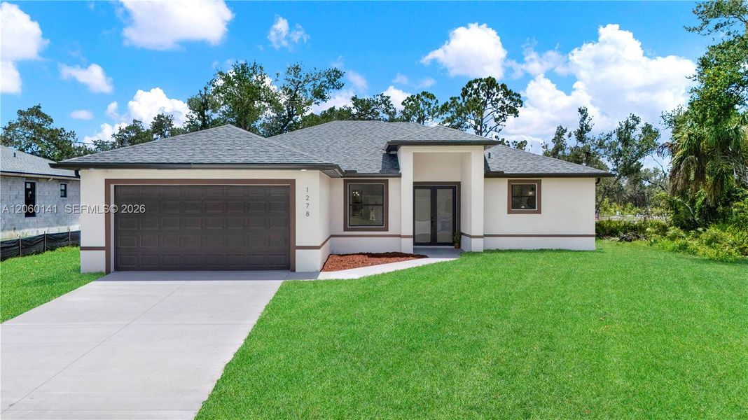 Front exterior of a new home in , Port Charlotte, FL, highlighting curb appeal (Image 2). Front exterior of a new home in , Port Charlotte, FL, highlighting curb appeal (Image 2).