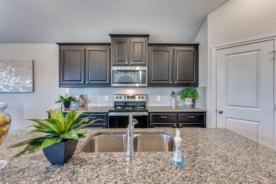 Furnished interior in a model home at Brookville Ranch in Fort Worth (Image 27).