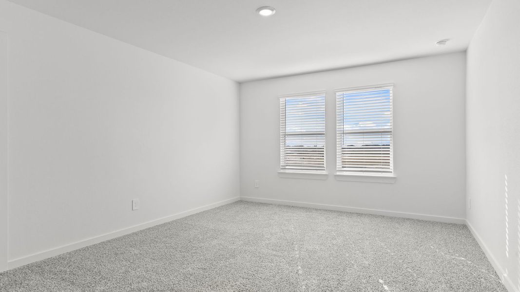 Spacious, unfurnished interior of a new home in Villarosa at Tamarron, Katy (Image 43).