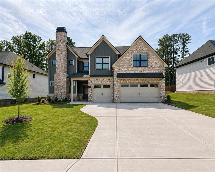 Front exterior of a new home in , Lawrenceville, GA, highlighting curb appeal (Image 26).