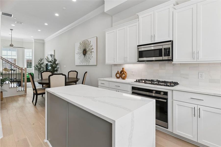 Image of model home with similar floorplan.