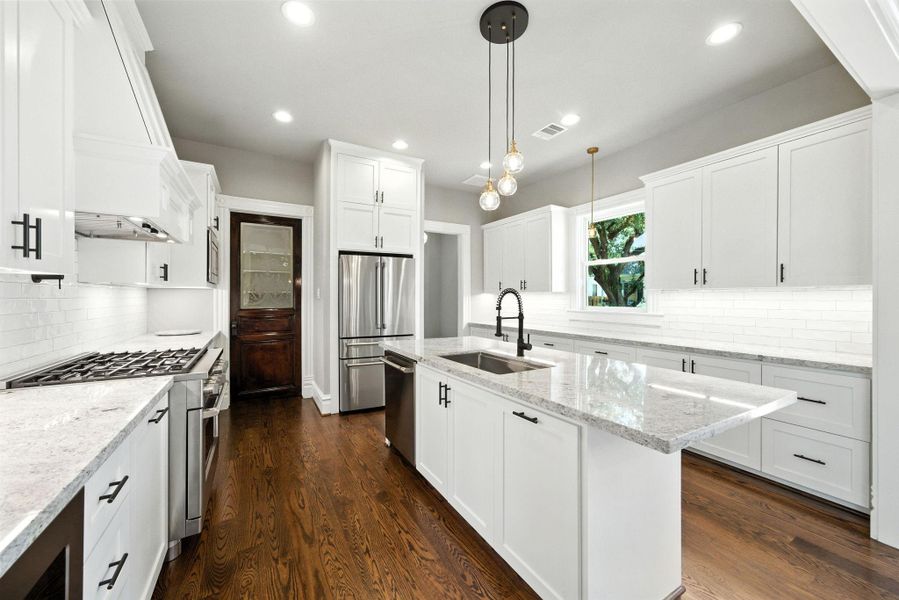 Plenty of cabinets. All soft close doors and drawers. Single bowl stainless steel sink. SO MUCH STORAGE in this kitchen and pantry! Plenty of cabinets. All soft close doors and drawers. Single bowl stainless steel sink. SO MUCH STORAGE in this kitchen and pantry!