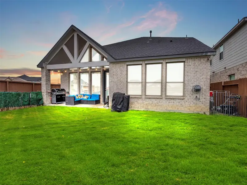 Exterior details and patio area of a home in The Trails, New Caney (Image 3).