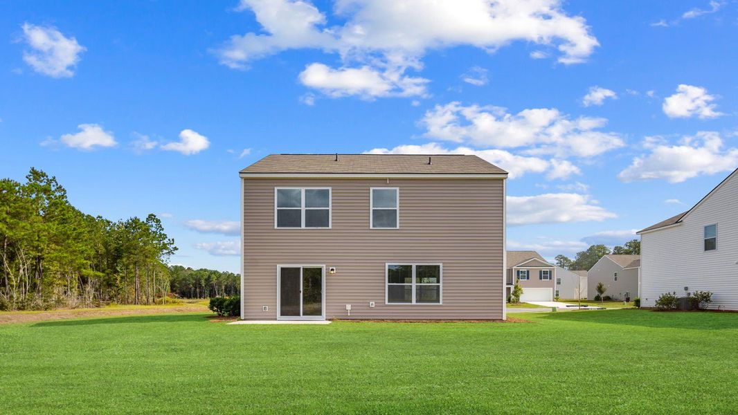 Exterior details and patio area of a home in The Groves at Bees Creek, Ridgeland (Image 4). Exterior details and patio area of a home in The Groves at Bees Creek, Ridgeland (Image 4).