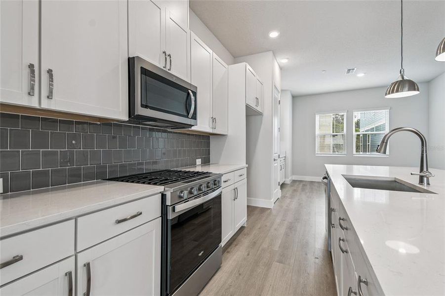 Furnished interior view inside a new home in Apex at Seminole Heights, Tampa (Image 14). Furnished interior view inside a new home in Apex at Seminole Heights, Tampa (Image 14).