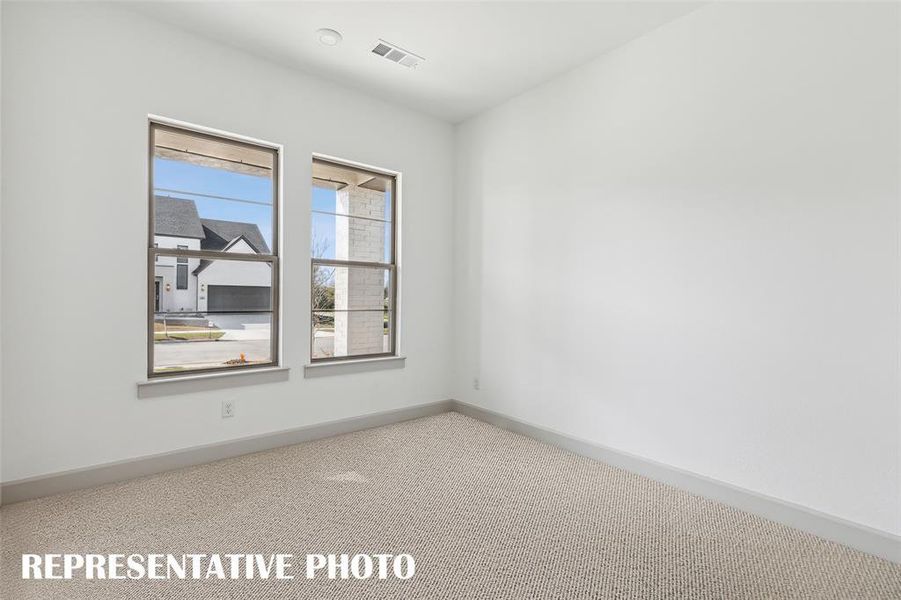 You'll find nicely sized secondary bedrooms in our Versailles II plan.  REPRESENTATIVE PHOTO