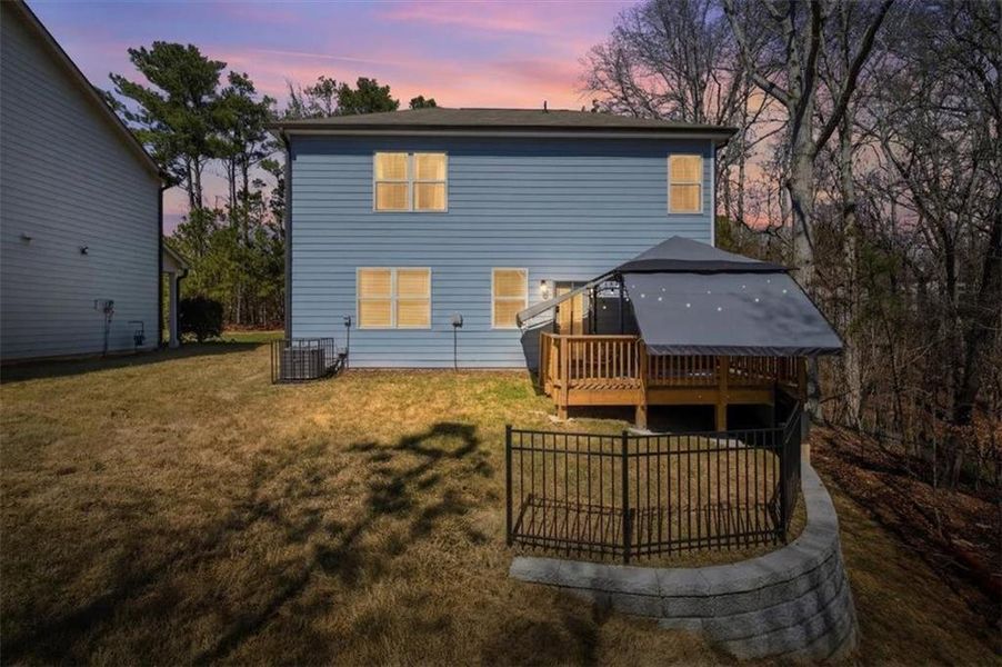 Exterior details and patio area of a home in Tell River, Atlanta (Image 28). Exterior details and patio area of a home in Tell River, Atlanta (Image 28).