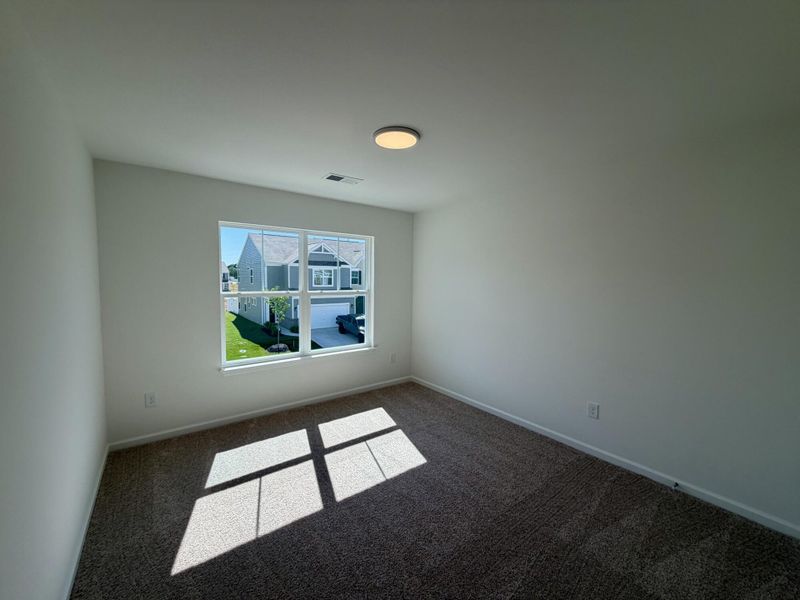 Spacious, unfurnished interior of a new home in Bellevue Townhomes, Greenville (Image 14).