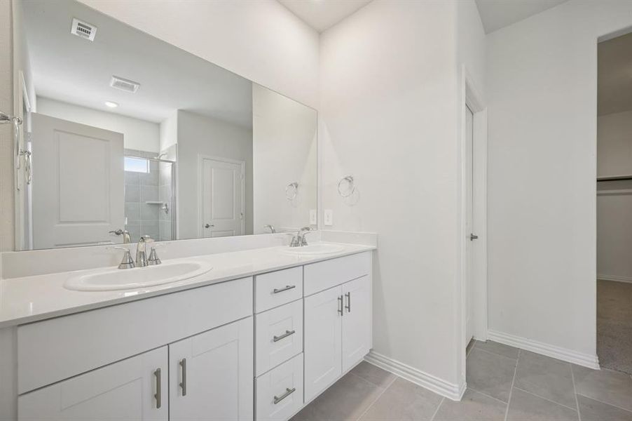 Furnished interior view inside a new home in Lakehaven - Premier Series, Farmersville (Image 11).