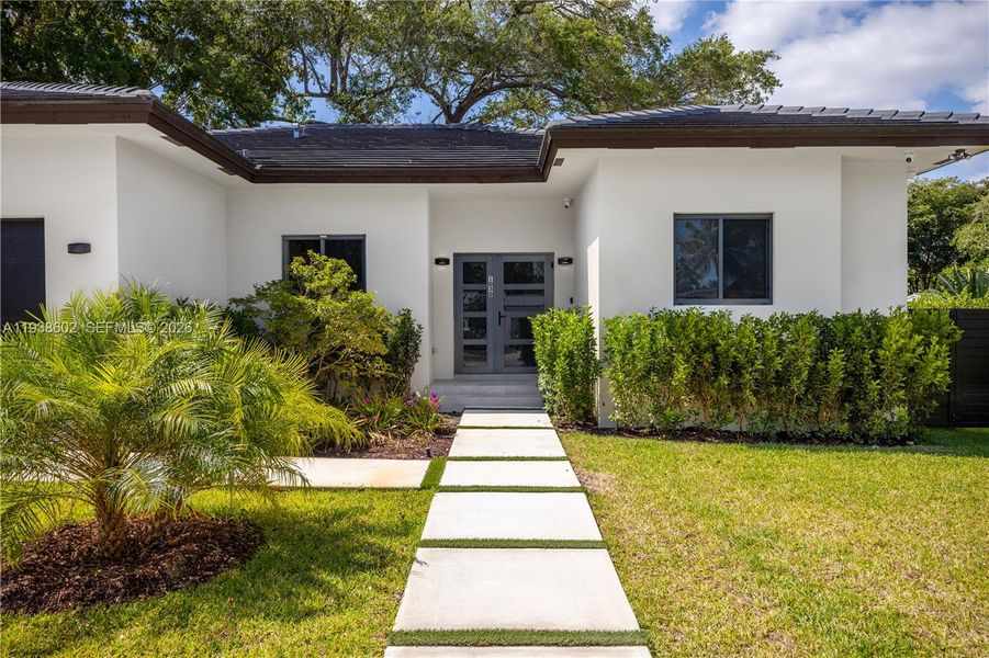 Front exterior of a new home in , Biscayne Park, FL, highlighting curb appeal (Image 22).