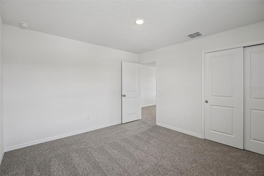 Spacious, unfurnished interior of a new home in Two Rivers - Premier Series, Zephyrhills (Image 21).