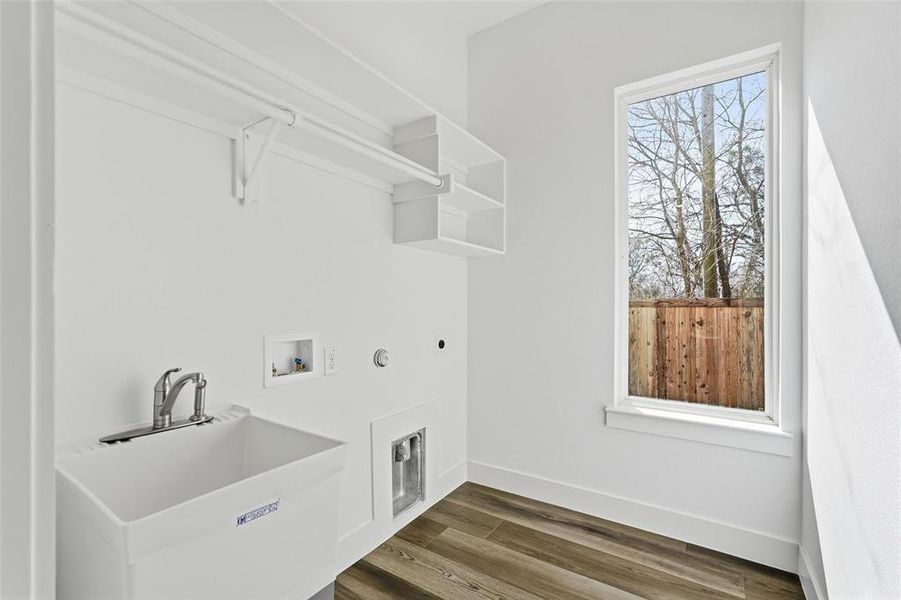 Utility Room with Sink and Washer/Dryer connections
