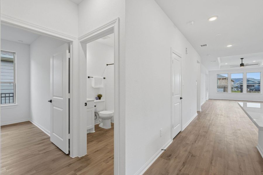 This light-filled interior flows effortlessly from the hallway into the living space, with a conveniently located bath and thoughtful room placement throughout, all enhanced by abundant natural light.