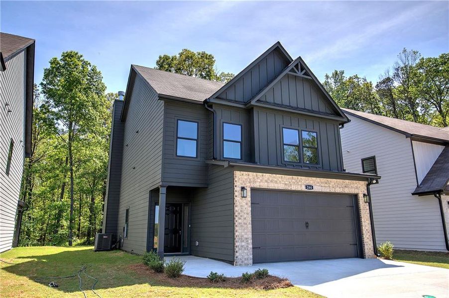 Front exterior of a new home in , Cartersville, GA, highlighting curb appeal (Image 17).