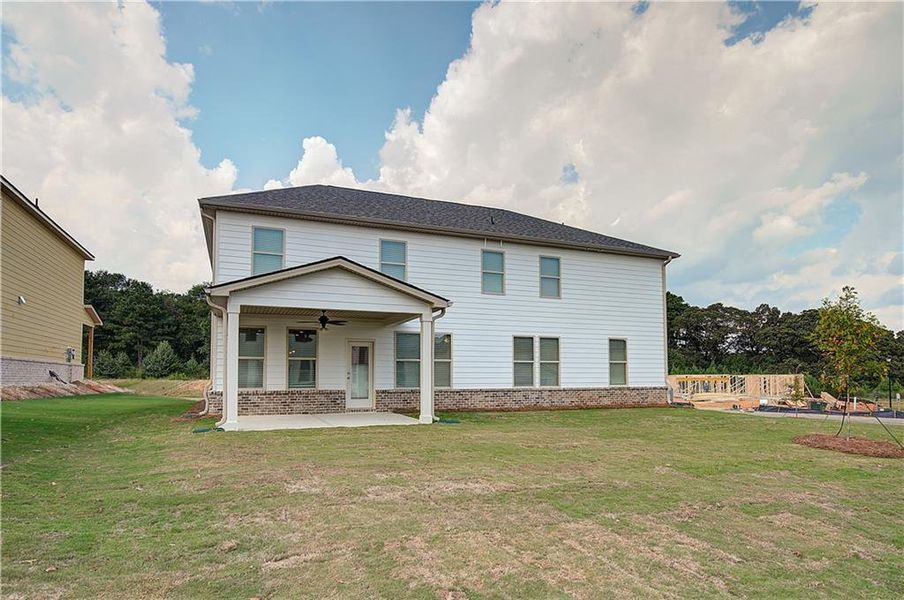 Exterior details and patio area of a home in Adagio, Dacula (Image 4).