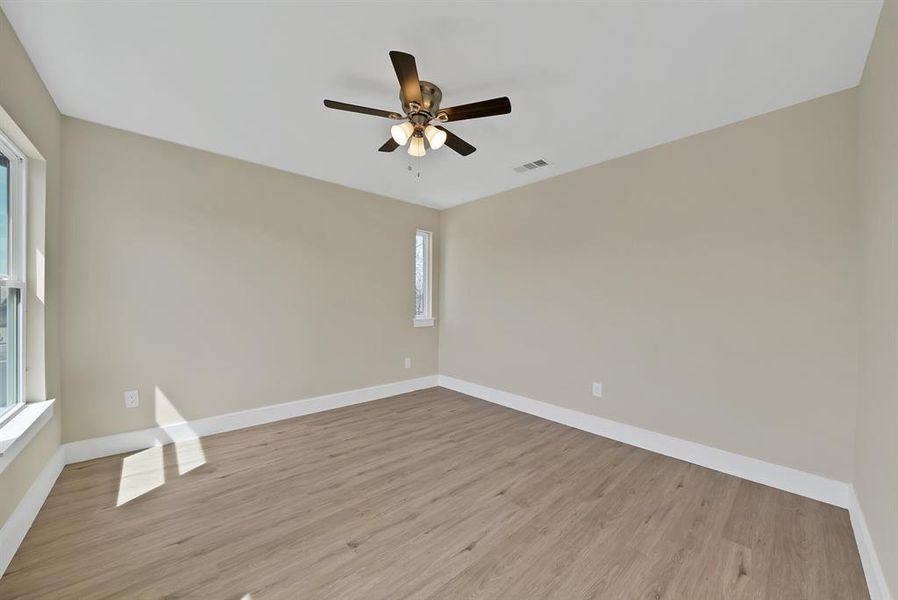 Spacious, unfurnished interior of a new home in , The Colony (Image 34).