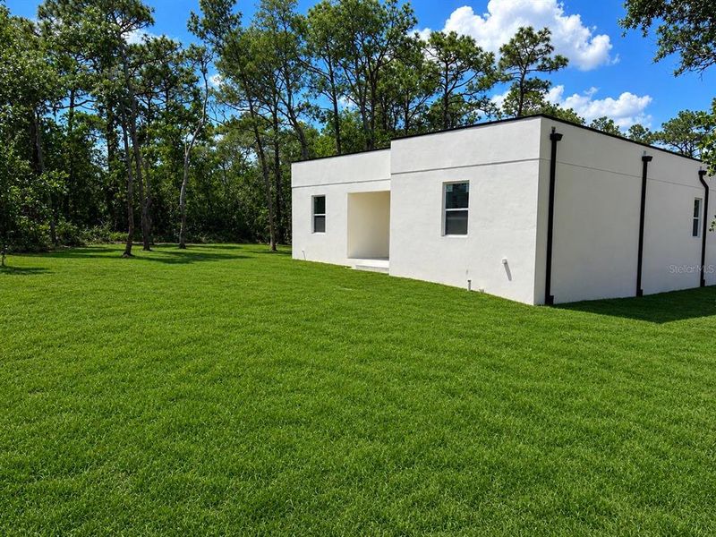 Exterior details and patio area of a home in , Brooksville (Image 15).