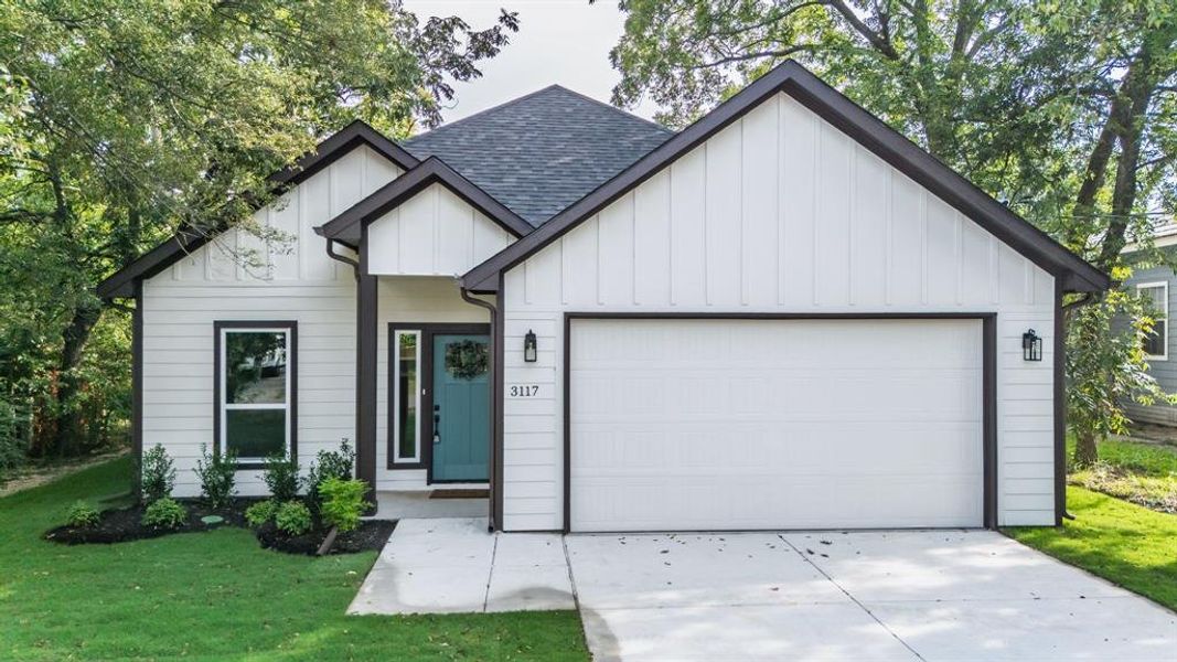 Front exterior of a new home in , Greenville, TX, highlighting curb appeal (Image 21). Front exterior of a new home in , Greenville, TX, highlighting curb appeal (Image 21).