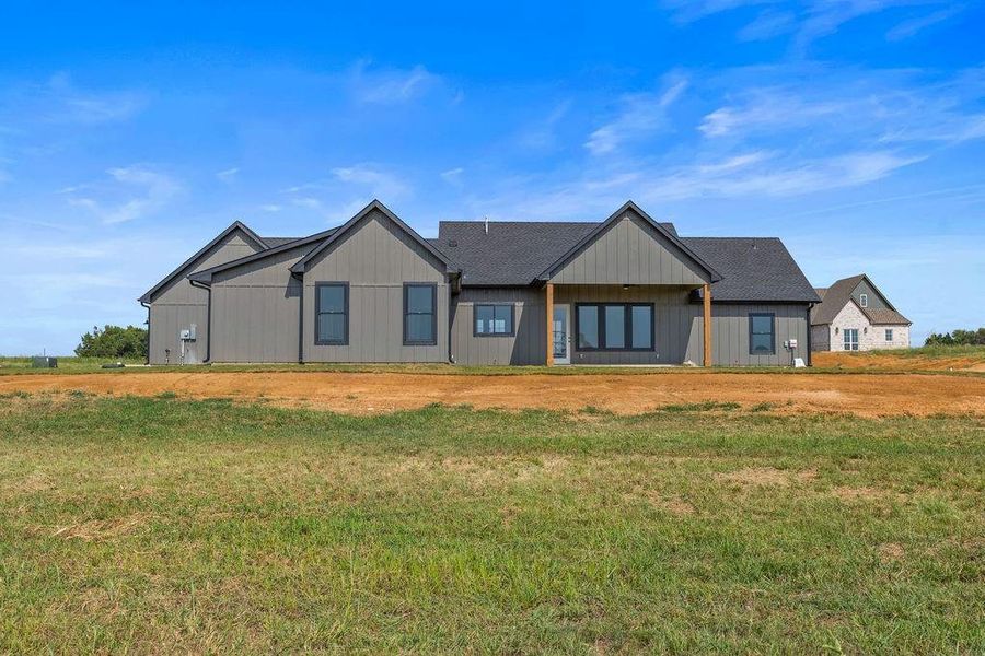 Front exterior of a new home in , Whitesboro, TX, highlighting curb appeal (Image 20). Front exterior of a new home in , Whitesboro, TX, highlighting curb appeal (Image 20).