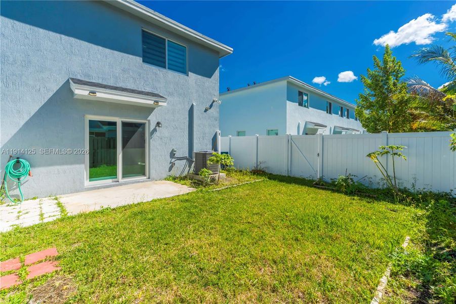 Exterior details and patio area of a home in , Florida City (Image 3).