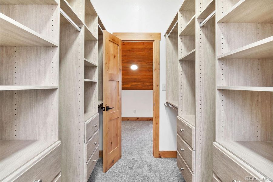 Upper level bedroom walk in closet