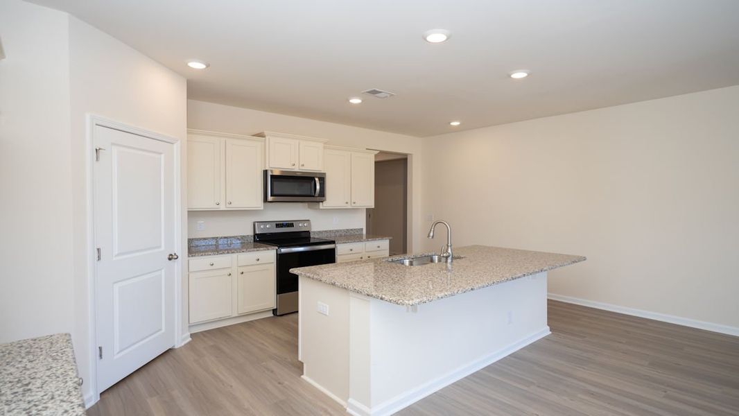 Representative furnished interior of a home built from the CALI by D.R. Horton in Island Green, Myrtle Beach (Image 11).