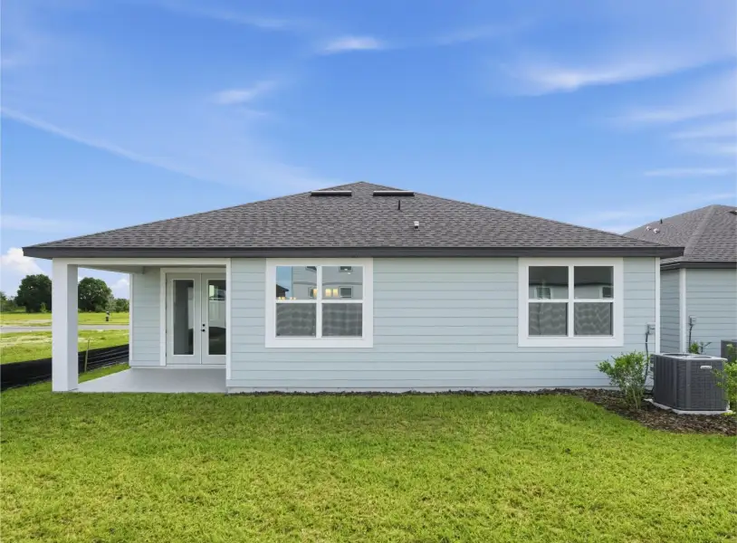 Exterior details and patio area of a home in Trailside, Mount Dora (Image 4).